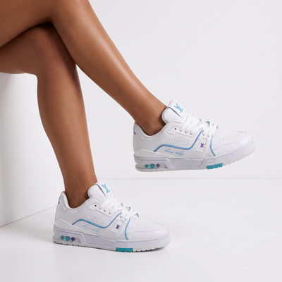 White Louis Vuitton low-top trainer with turquoise and purple accents, LV logo on tongue and embossed monogram