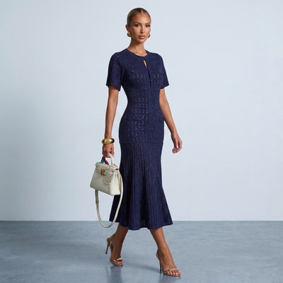 navy knit midi dress with button front, short sleeves and pleated skirt