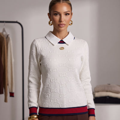 Cream white Gucci knit sweater with polo collar, gold double‑G button and navy-red ribbed hem