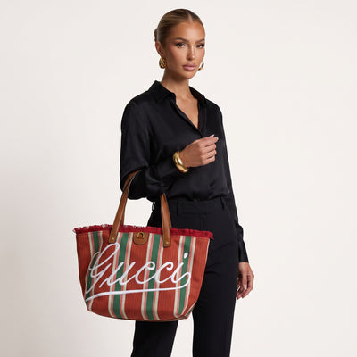 Gucci large orange and green striped tote bag with leather handles