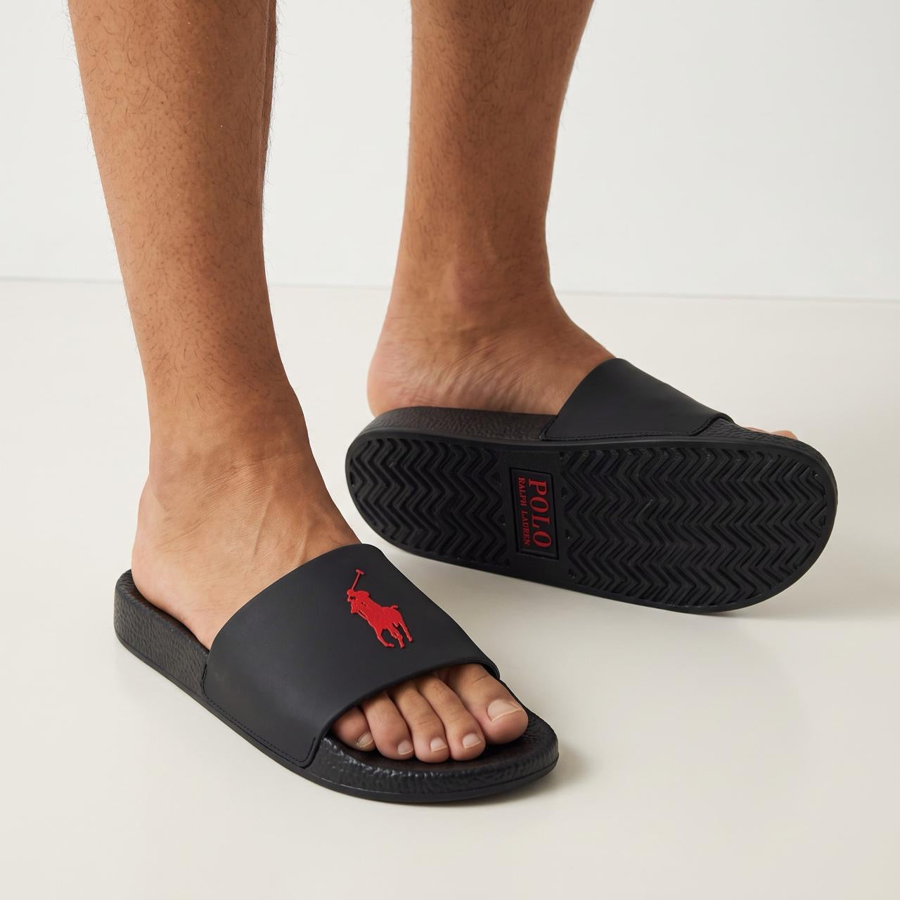 Black Polo Ralph Lauren slide sandal with red pony logo and textured sole