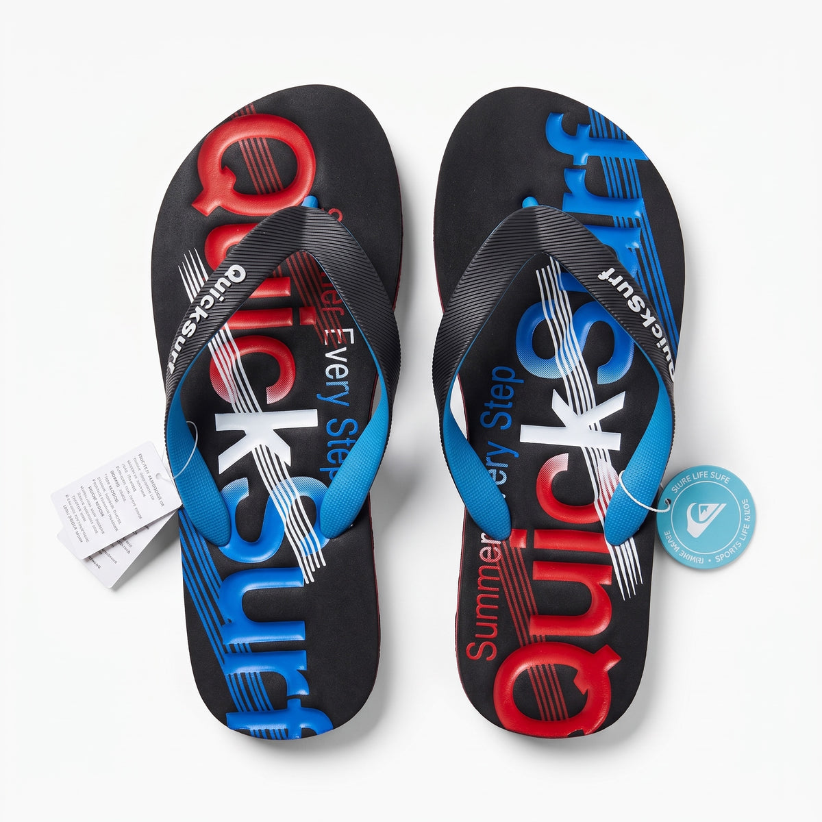 black flip flops with blue and red printed footbed and black straps reading QuickSurf