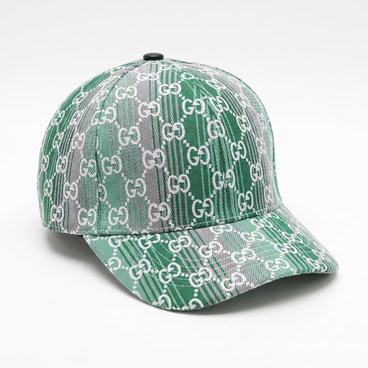 Green Gucci baseball cap with white GG monogram pattern