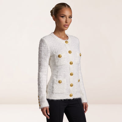 White Balmain tweed jacket with gold buttons and patch pockets