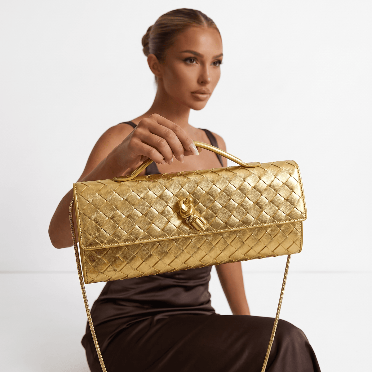 Bottega Veneta Gold Intrecciato Knot Clutch – Luxury Evening Handbag - MASTERPIECE