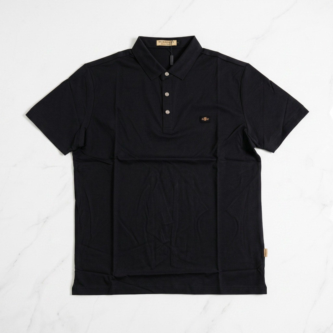 🖤 Burberry Essential Black Polo Shirt – Timeless British Luxury - MASTERPIECE