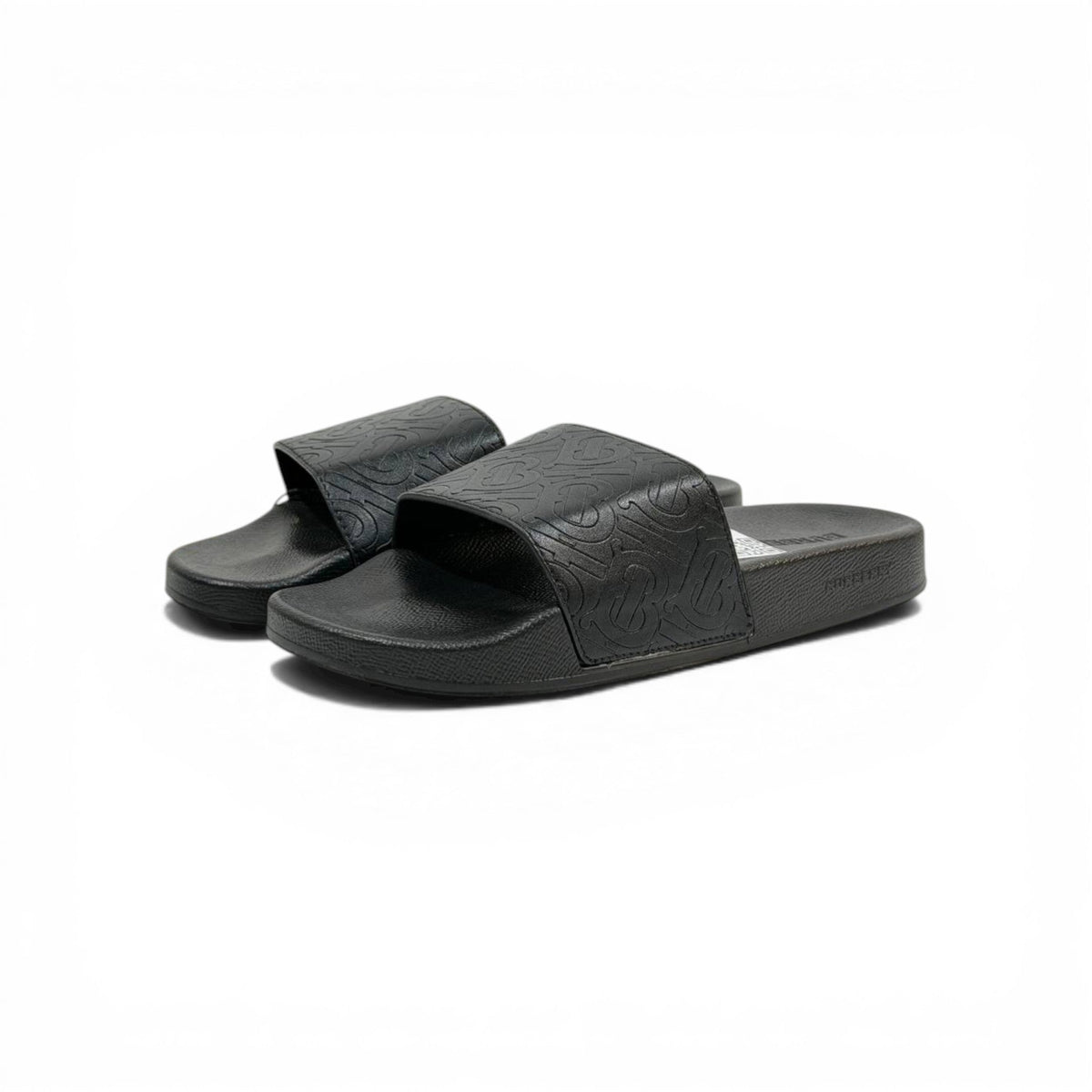 BURBERRY Luxury Black Slide Sandals – Embossed Monogram Comfort & Premium Streetwear 👟✨ - MASTERPIECE