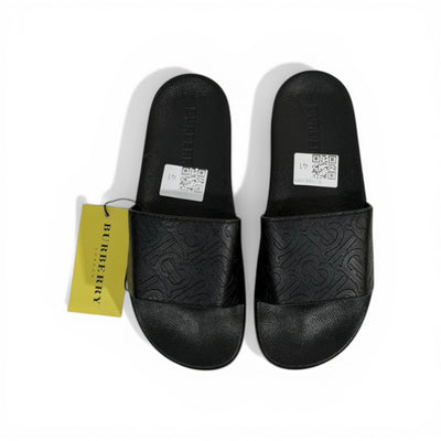 BURBERRY Luxury Black Slide Sandals – Embossed Monogram Comfort & Premium Streetwear 👟✨ - MASTERPIECE