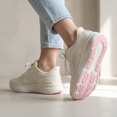 Cream Skechers low-top sneakers with pink sole accents