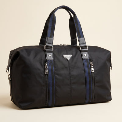 Prada black nylon weekender bag with blue striped handles and triangle logo