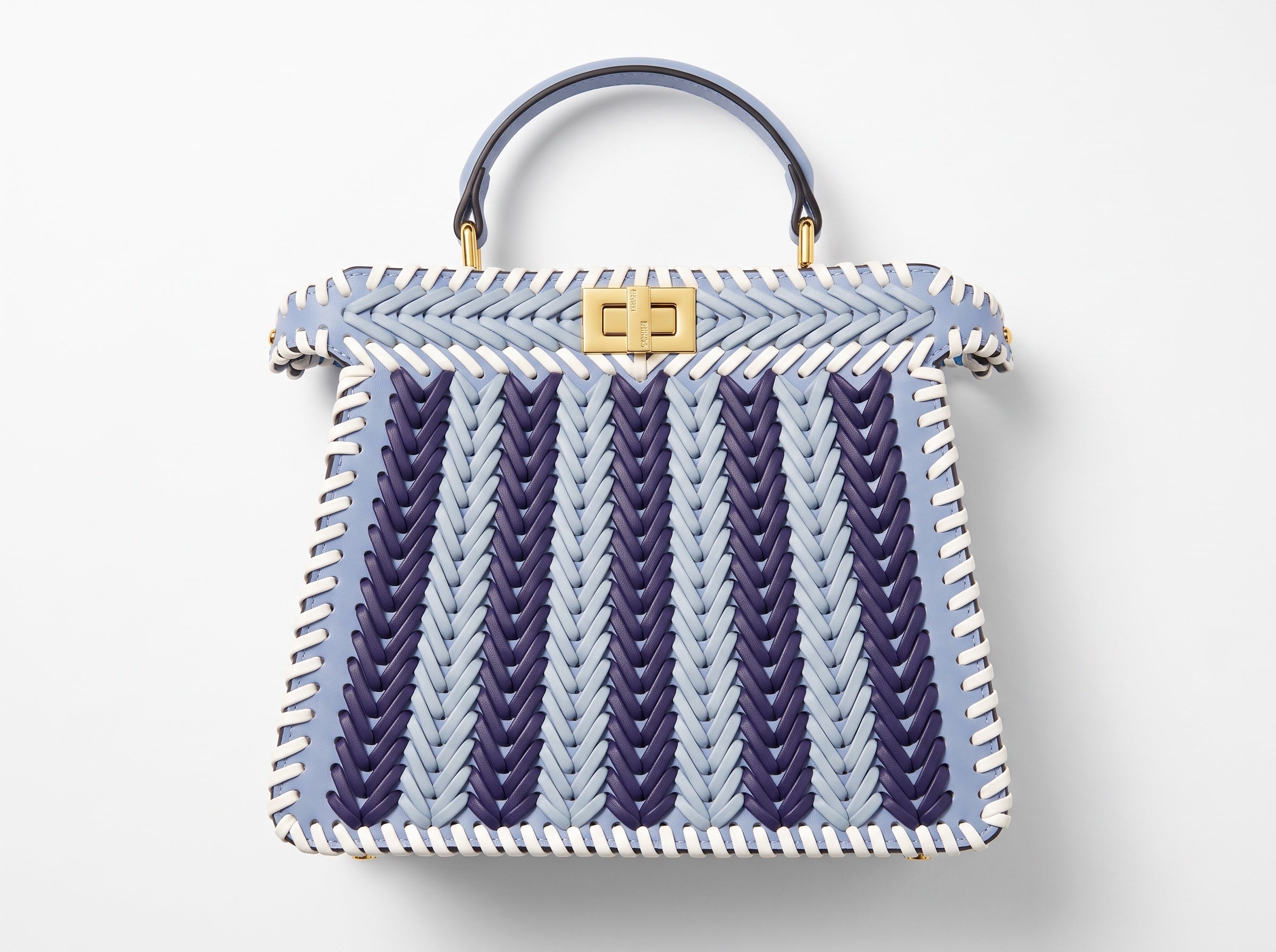 Light blue woven top-handle bag with white whipstitch trim and gold turn-lock clasp