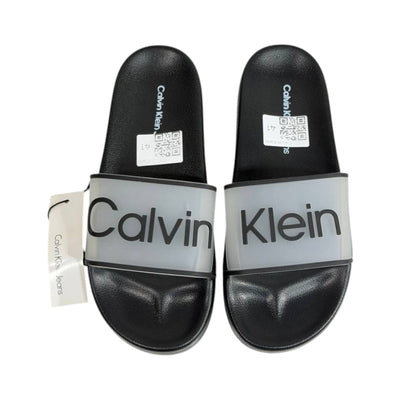 Calvin Klein Black Transparent Logo Slides – Modern Minimalist Summer Sandals 🖤👡 - MASTERPIECE