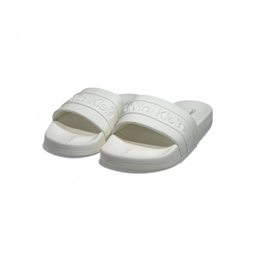 Calvin Klein Embossed Logo Slide Slippers — White