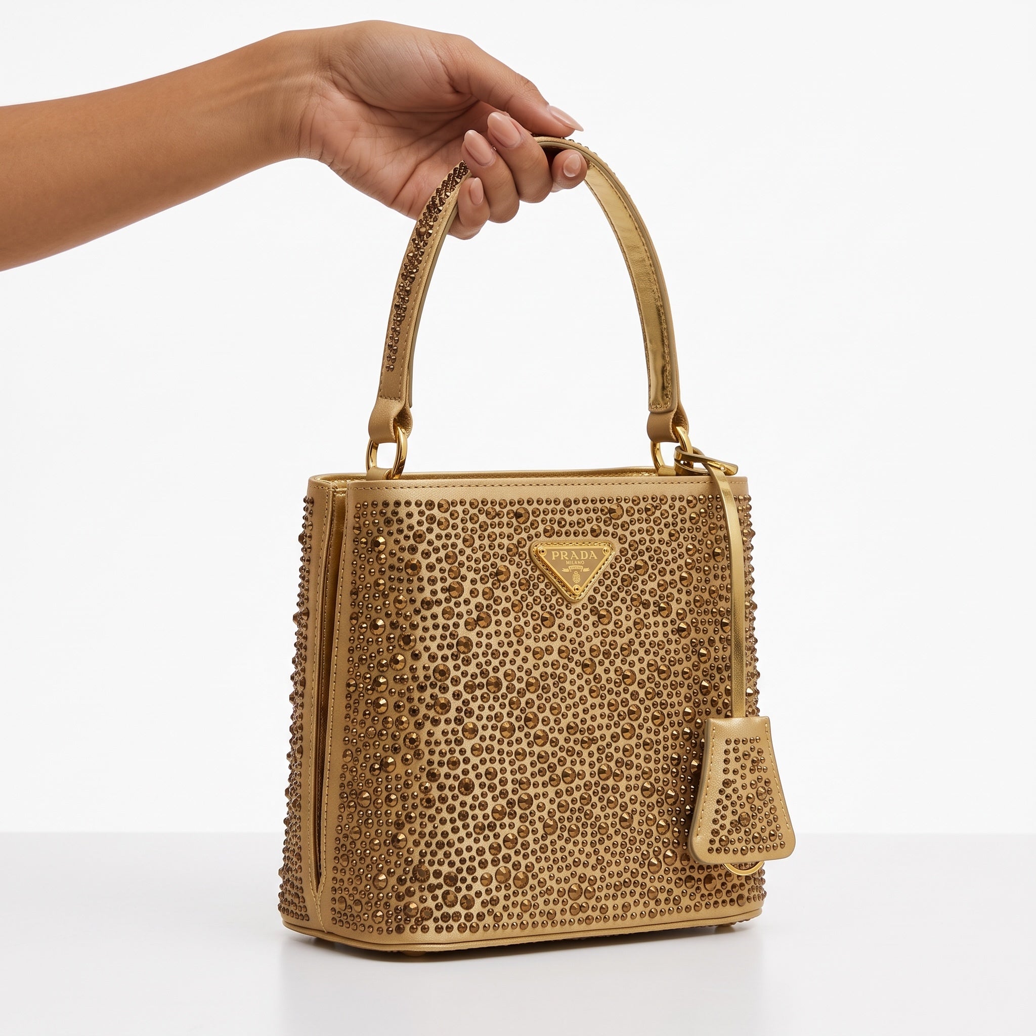Prada gold studded top-handle shoulder bag with triangular logo plaque