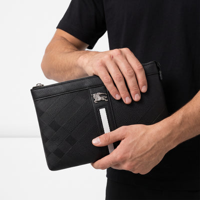 Black Burberry embossed zip pouch with silver equestrian knight plaque