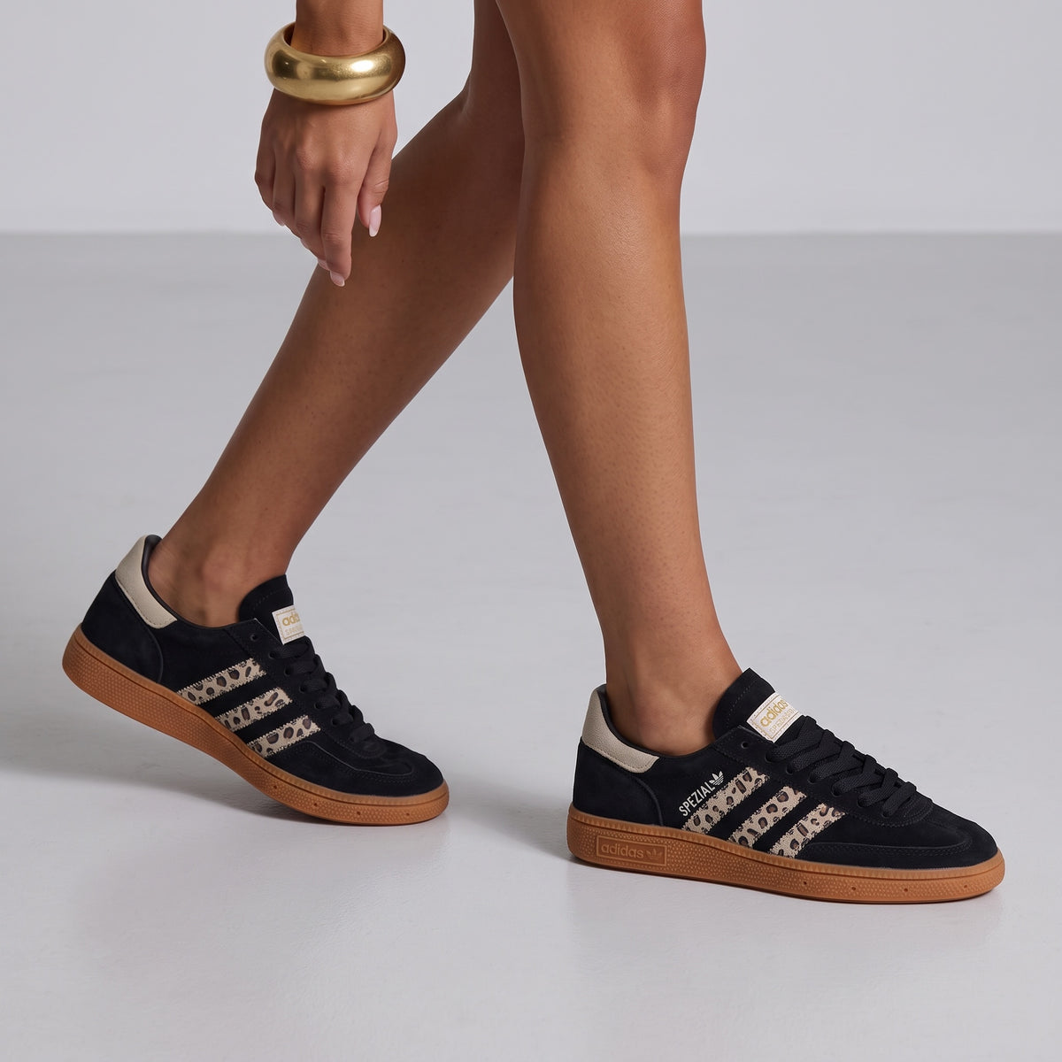 adidas Spezial black sneakers with leopard three-stripes and gum sole