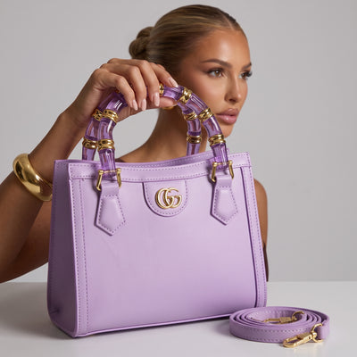 Lavender Gucci small tote with translucent purple handles and gold hardware