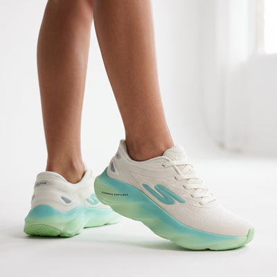 Skechers Wave Runner platform sneaker with white upper and mint-to-green gradient sole