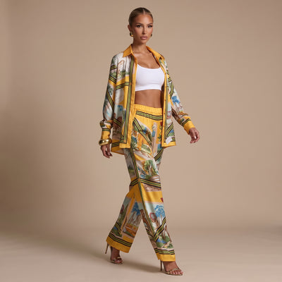 Yellow printed two-piece pajama set with button shirt and wide-leg trousers