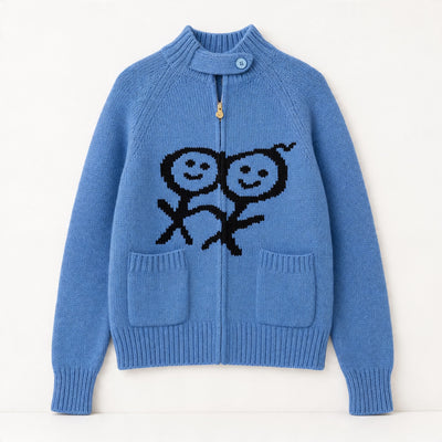 blue zip knit cardigan with high ribbed collar, button tab and black smiley motif