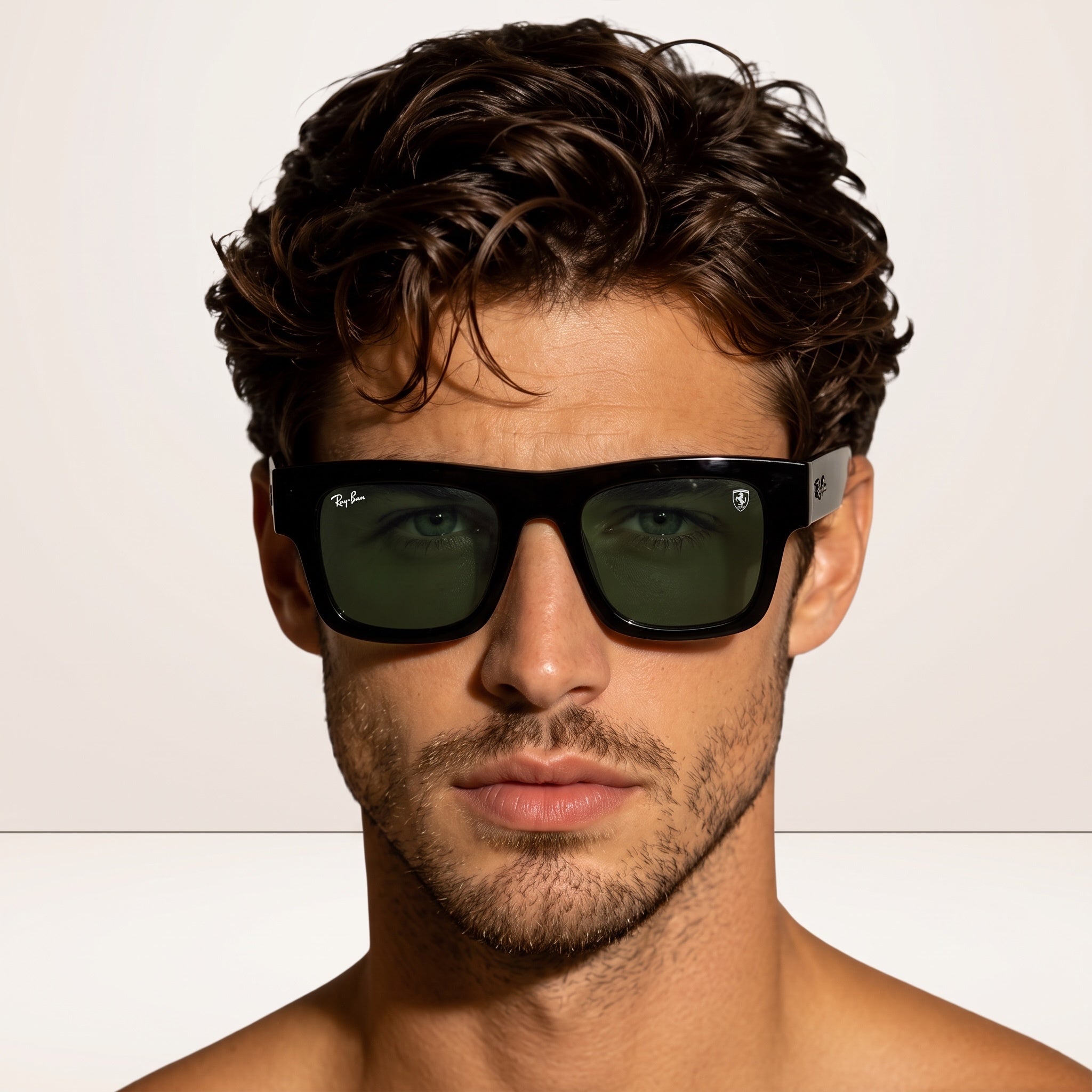 Black square Ray-Ban Ferrari sunglasses with green lenses on male model