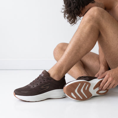 brown Skechers mesh sneakers with white sole
