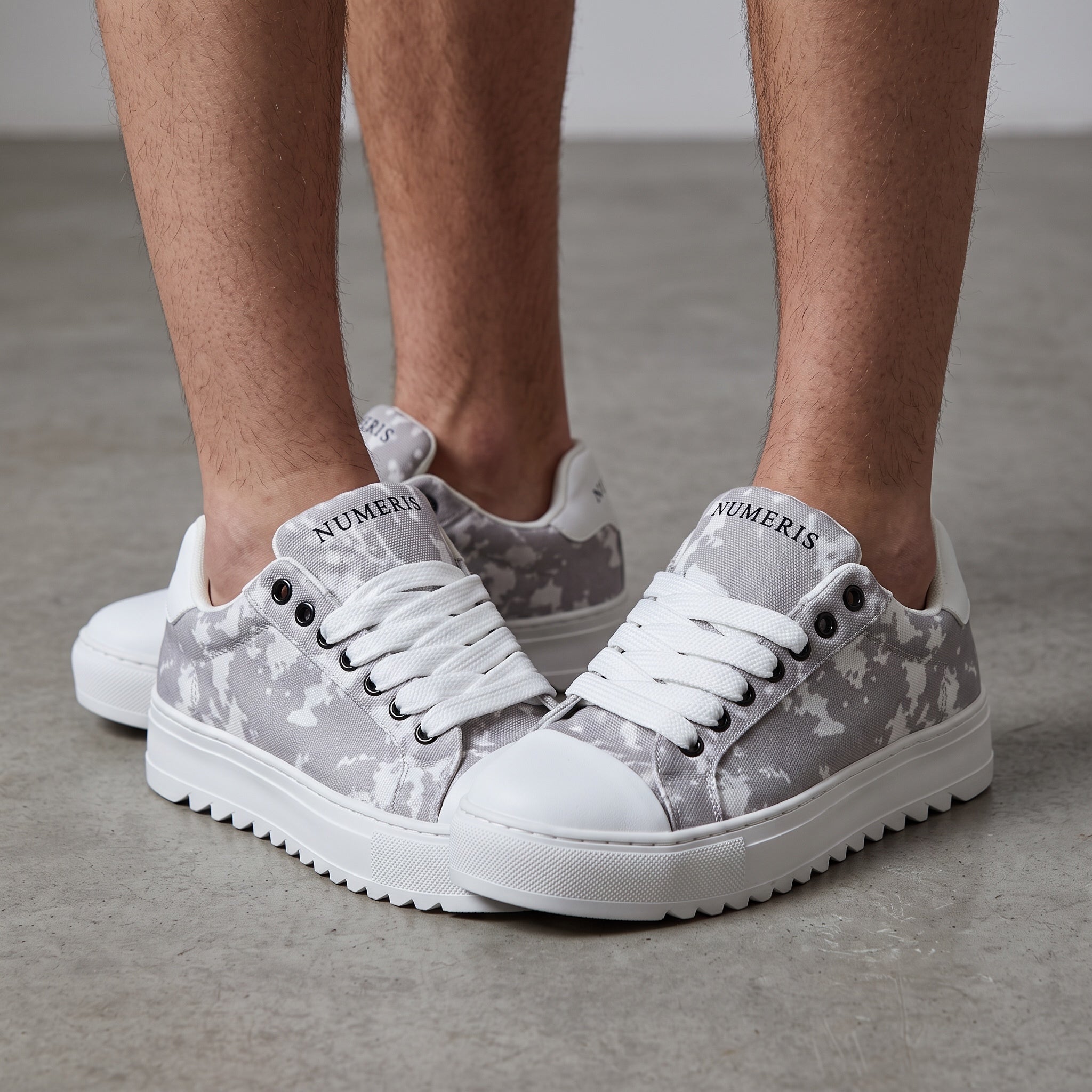 Grey camo Numeris low-top platform sneakers with white sole