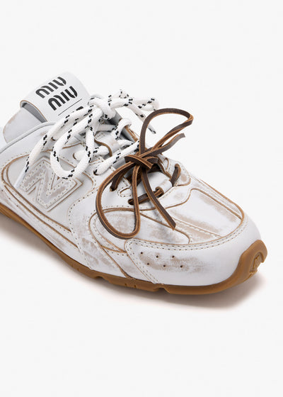 Miu Miu x New Balance white mule sneakers with gum sole and mixed laces