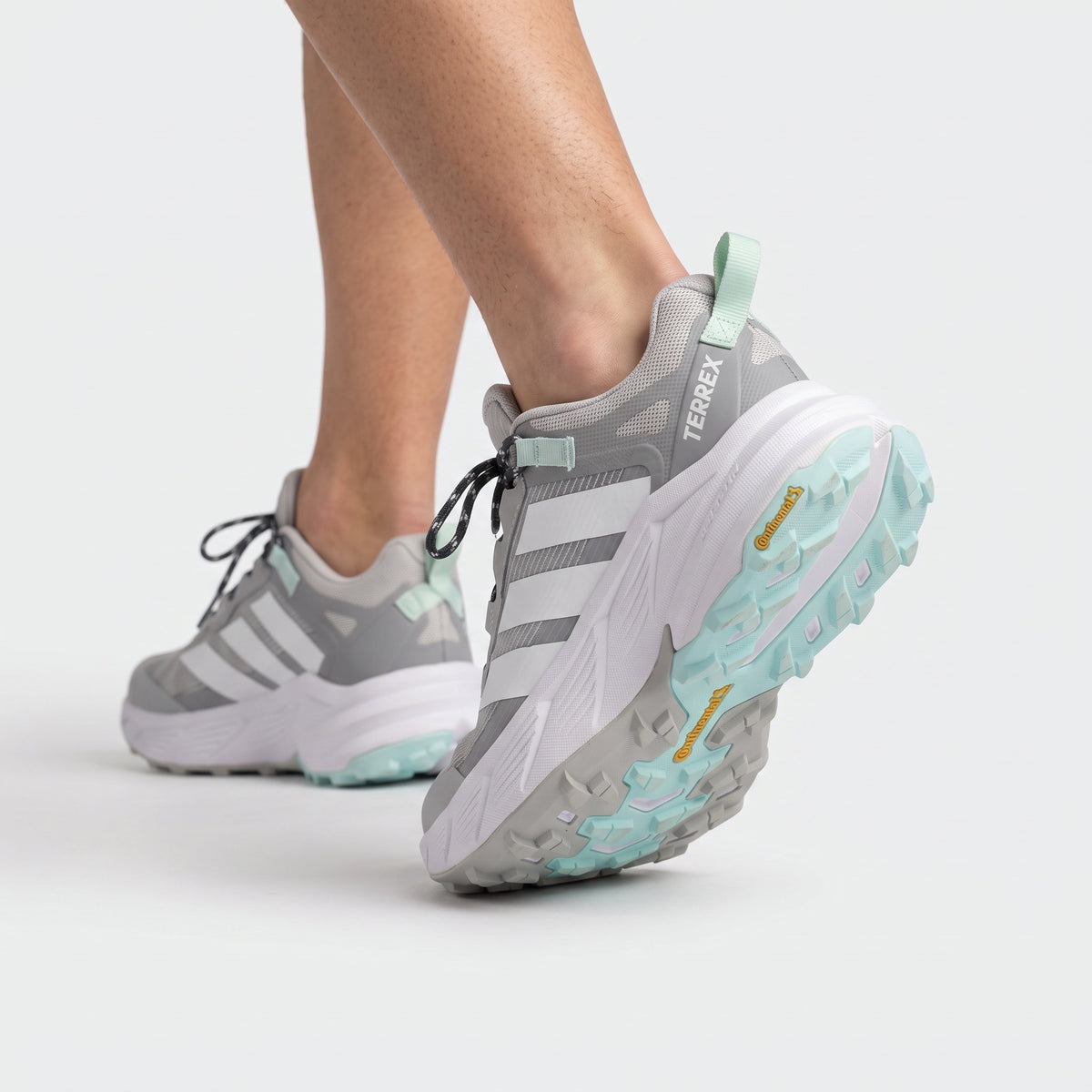 Adidas Terrex grey and mint trail runner with lugged Continental outsole
