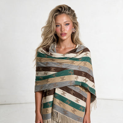 Brown Celine Triomphe shawl with fringe and repeating logo motif wrapped around model