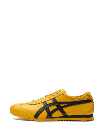 Yellow Onitsuka Tiger Mexico 66 sneaker with black stripes side view