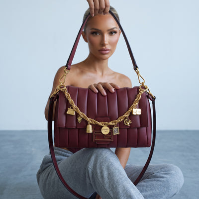 burgundy quilted Fendi shoulder bag with gold charm chain