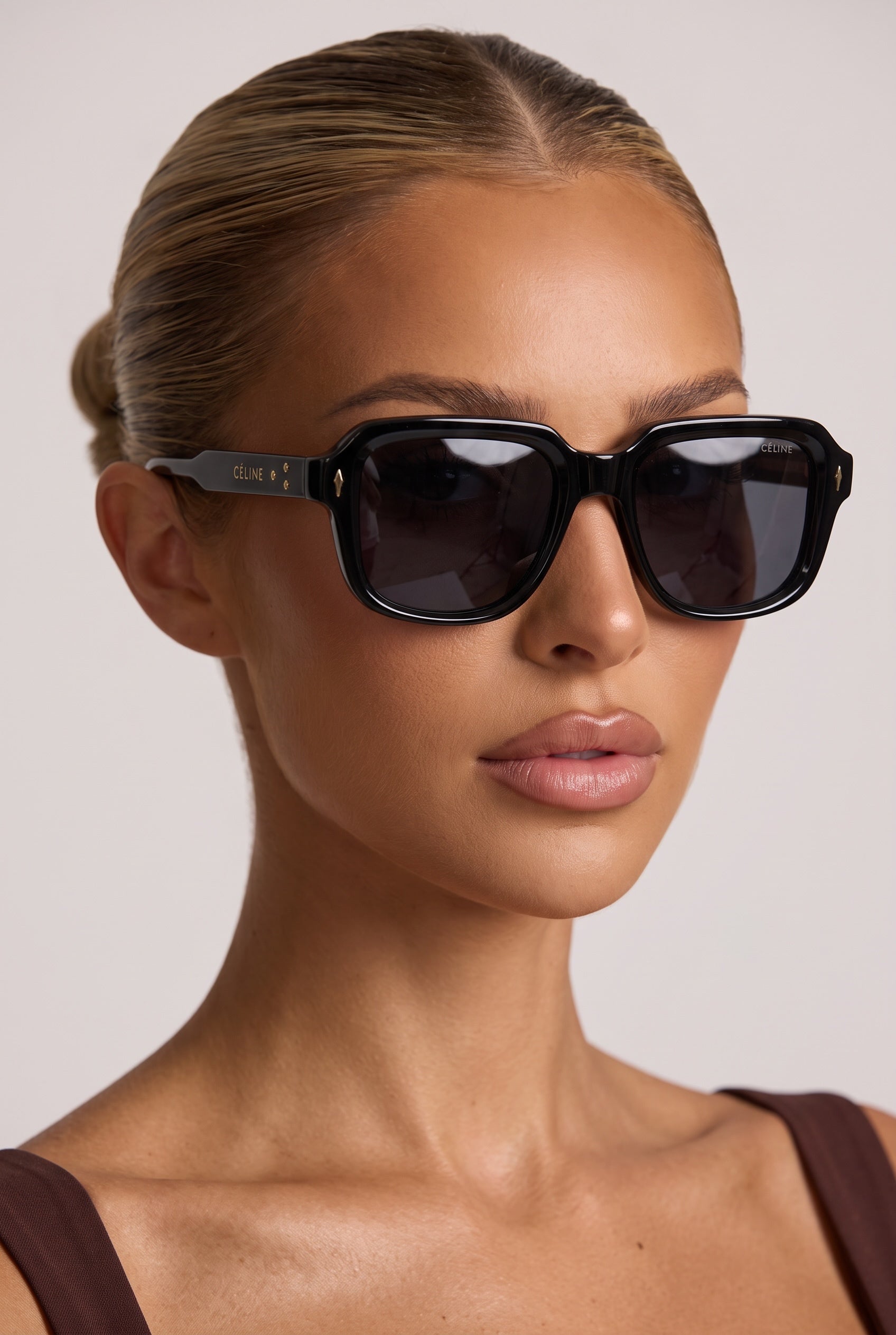 Céline oversized black square sunglasses with dark lenses on model