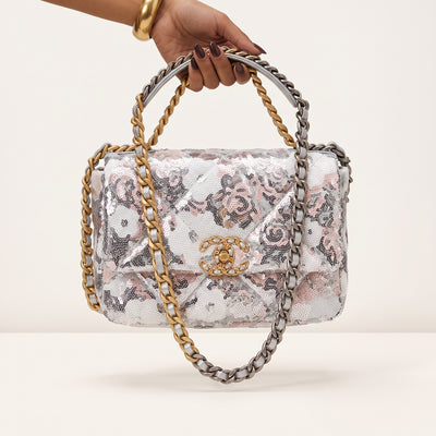 Chanel sequin floral quilted flap bag with gold double C and mixed metal chain handle