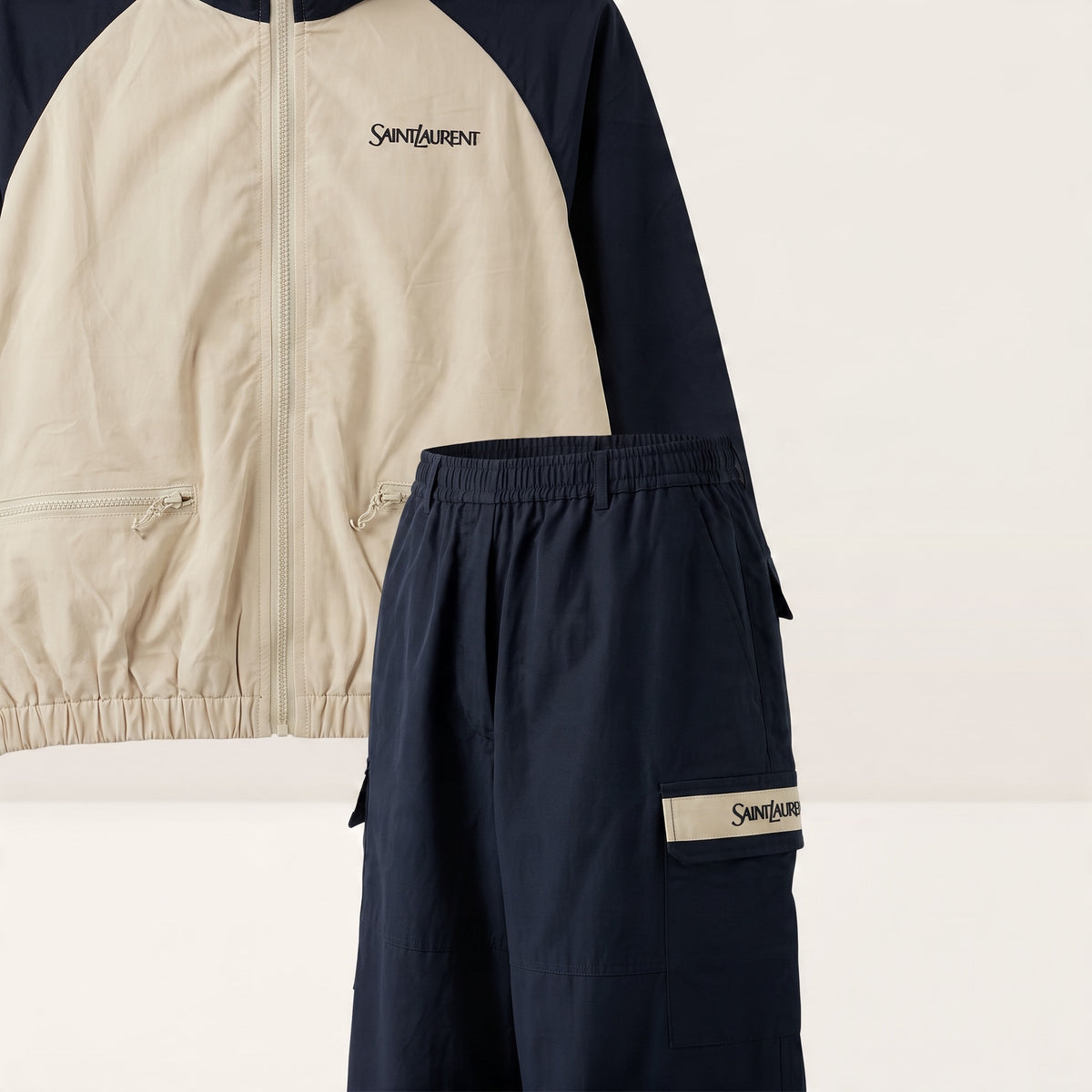 Saint Laurent beige and navy track jacket with cargo trousers laid flat and on model