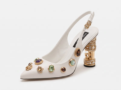 White Dolce & Gabbana slingback heels with jeweled embellishments and gold sculptural heels