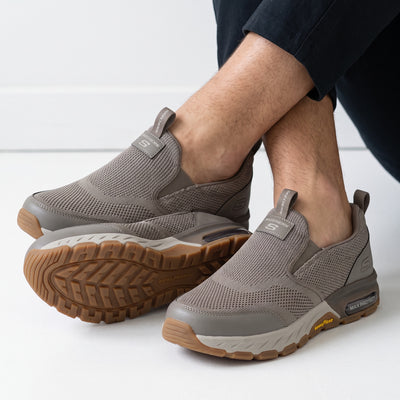 Skechers taupe knit slip-on sneaker with chunky white midsole and gum Goodyear outsole