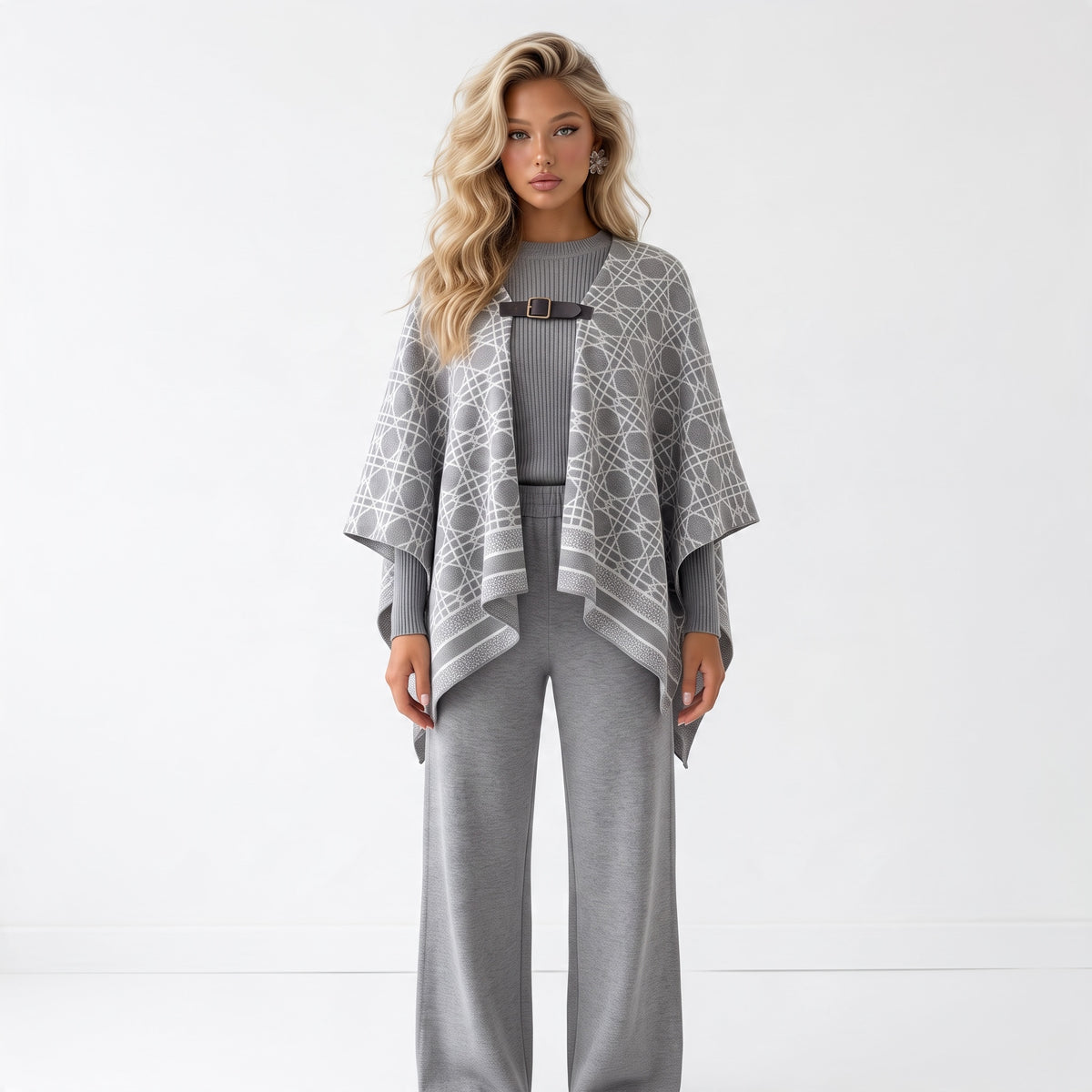 Grey geometric patterned cape with front buckle closure