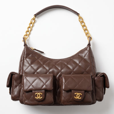 Chocolate brown quilted Chanel shoulder bag with gold chain and CC hardware