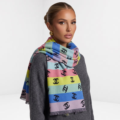 Black scarf with multicolor Chanel CC logo pattern and fringed ends