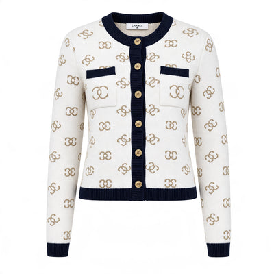 Chanel cream cardigan with navy trim, gold buttons and all-over CC logo pattern