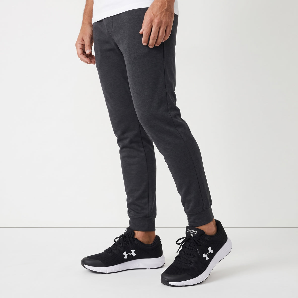 Under Armour black charged running shoes with white midsole