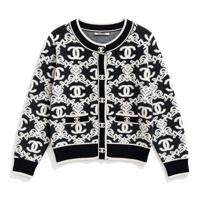 Black and ivory Chanel knit cardigan with CC buttons and patch pockets