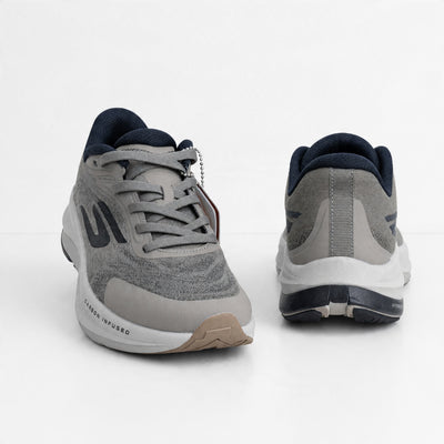 pair of grey Skechers trainers with carbon-infused midsole