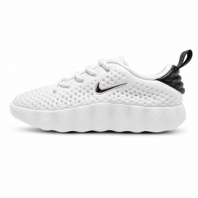 White Nike low-top perforated sneaker with black heel and podded sole