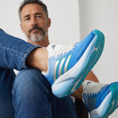 blue adidas running shoes with white midsole and aqua outsole