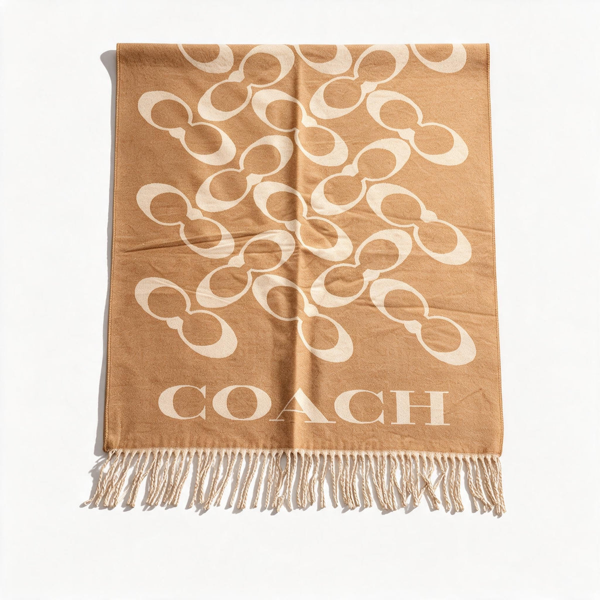 Tan Coach scarf with cream repeating logo and fringed ends