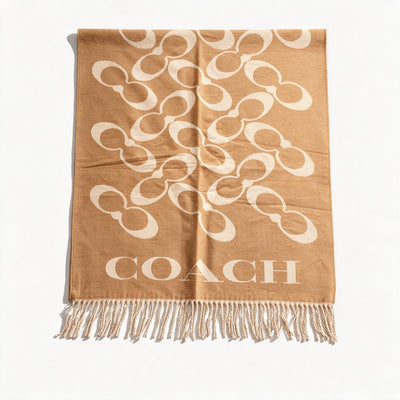 Tan Coach scarf with cream repeating logo and fringed ends
