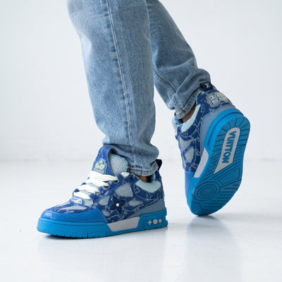 blue Louis Vuitton monogram low-top sneaker with bright blue sole
