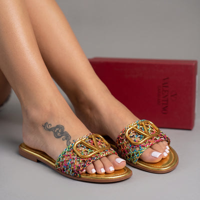 Valentino multicolor braided slides with gold V logo on gold footbed